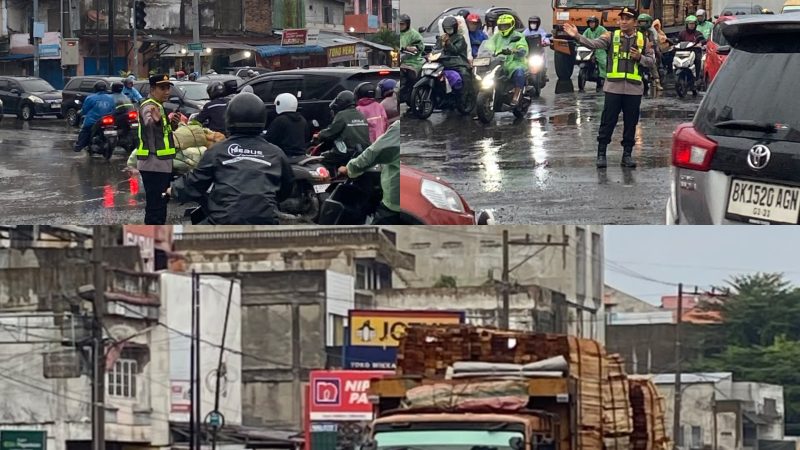 Diguyur Hujan Kapolsek Sunggal Turun Langsung Atur Lalin Pagi,Jalur Medan-Binjai Terpantau Lancar